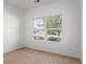 Simple bedroom with large window and neutral decor at 8200 E 8Th Ave # 8101, Denver, CO 80230