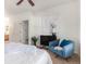 Relaxing bedroom with a comfy chair and plenty of natural light at 8200 E 8Th Ave # 8101, Denver, CO 80230