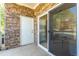 Private patio with sliding glass door access from living area at 8200 E 8Th Ave # 8101, Denver, CO 80230