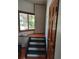 Steps leading to the upper level of home at 9655 Morrison Rd, Lakewood, CO 80227