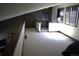 Spacious loft area with carpet and multiple windows at 9655 Morrison Rd, Lakewood, CO 80227