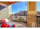 Private patio with seating and a view of the community at 10052 W Ute Pl # 206, Littleton, CO 80127