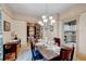 Elegant dining room with hardwood floors and chandelier at 917 Kalamath St, Denver, CO 80204