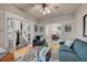 Spacious living room features hardwood floors and a view into the dining room at 917 Kalamath St, Denver, CO 80204