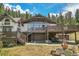 Two-story home with large deck and mountain views at 1774 Upper Bear Creek Rd, Evergreen, CO 80439