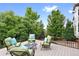 Relaxing deck with comfortable seating and a view of the backyard at 12527 Tapadero Way, Castle Pines, CO 80108