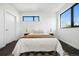 Spacious bedroom with large windows and a view, offering ample natural light at 1601 Park Ave # 216, Denver, CO 80218