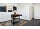 Modern home office featuring a desk, chair, and stylish artwork at 1601 Park Ave # 216, Denver, CO 80218