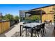 Community rooftop deck with pergola and modern furniture at 1601 Park Ave # 216, Denver, CO 80218