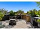 Relax on this furnished rooftop terrace with fire pit and BBQ area at 1601 Park Ave # 216, Denver, CO 80218