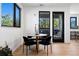 Dining area with a round table and chairs near a balcony at 1601 Park Ave # 216, Denver, CO 80218