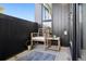 Private patio with wicker furniture and a relaxing atmosphere at 1601 Park Ave # 216, Denver, CO 80218