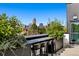 Enjoy city views from this rooftop deck, complete with seating and a bar at 1601 Park Ave # 216, Denver, CO 80218