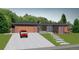 Ranch style home with attached garage and landscaped yard at 755 S Jackson St, Denver, CO 80209