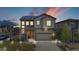 Two story home with attached garage and landscaped yard at 2688 Loon Cir, Castle Rock, CO 80104