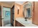 Bathroom with updated vanity and a view to bedroom at 2227 Canyon Blvd # 253B, Boulder, CO 80302