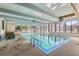 Inviting indoor pool and spa area with ample natural light at 2227 Canyon Blvd # 253B, Boulder, CO 80302