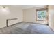 Spacious bedroom with large window and neutral wall colors at 2227 Canyon Blvd # 253B, Boulder, CO 80302