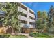 Condo building exterior with landscaping and walkway at 2227 Canyon Blvd # 253B, Boulder, CO 80302