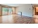 Bedroom with hardwood floors and access to balcony at 2227 Canyon Blvd # 253B, Boulder, CO 80302