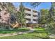 Condo building exterior with landscaping and walkway at 2227 Canyon Blvd # 253B, Boulder, CO 80302