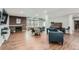 Spacious common area with comfortable seating, fireplace, and a piano at 2227 Canyon Blvd # 253B, Boulder, CO 80302