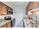 Updated kitchen featuring stainless steel appliances and granite countertops at 2227 Canyon Blvd # 253B, Boulder, CO 80302
