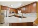Kitchen with stainless steel appliances and wood cabinets at 11685 Salem St, Henderson, CO 80640