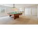 Basement game room featuring a pool table and bar area at 11685 Salem St, Henderson, CO 80640