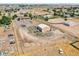Aerial view of property showing house, detached shop, and expansive land at 11685 Salem St, Henderson, CO 80640