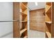 Large walk-in closet with built-in shelving and hanging rod at 11685 Salem St, Henderson, CO 80640
