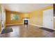 Living room with corner fireplace and tile flooring at 11685 Salem St, Henderson, CO 80640