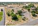 Aerial view showing house, expansive lot, and surrounding landscape at 11685 Salem St, Henderson, CO 80640
