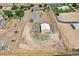 Aerial view showing house, detached shop, and large lot at 11685 Salem St, Henderson, CO 80640