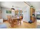 Large dining area with hardwood floors and kitchen view at 36023 Winchester Rd, Elizabeth, CO 80107