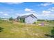 Ranch home with a deck, garden, and playset in a large yard at 36023 Winchester Rd, Elizabeth, CO 80107