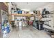 Garage with loft storage and ample space for tools and equipment at 13042 Grant E Cir # C, Thornton, CO 80241