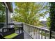 Private balcony overlooks a tree-lined street and neighborhood homes at 13042 Grant E Cir # C, Thornton, CO 80241
