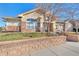 Two story building with brick and siding at 5726 N Genoa Way # 10-106, Aurora, CO 80019