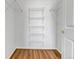 Walk-in closet with wire shelving; great for storage at 5726 N Genoa Way # 10-106, Aurora, CO 80019