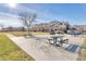 Concrete picnic area with multiple tables at 5726 N Genoa Way # 10-106, Aurora, CO 80019