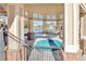 Covered seating area overlooking the pool at 5726 N Genoa Way # 10-106, Aurora, CO 80019