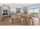 Modern kitchen with stainless steel appliances and island at 5049 Liverpool St, Denver, CO 80249