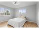 Cozy bedroom with hardwood floors and ample natural light at 8145 W 22Nd Ave, Lakewood, CO 80214