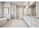 Elegant bathroom with double vanity, soaking tub, and walk-in shower at 2937 Hidden Den Ct, Franktown, CO 80116