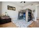 bedroom with a loft bed and ample storage at 2937 Hidden Den Ct, Franktown, CO 80116