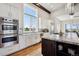 Bright kitchen with double ovens and expansive countertop space at 2937 Hidden Den Ct, Franktown, CO 80116