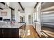 Elegant kitchen featuring granite countertops and custom cabinetry at 2937 Hidden Den Ct, Franktown, CO 80116