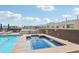 Rooftop hot tub with pool and lounge chairs at 3601 Arapahoe Ave # 226, Boulder, CO 80303