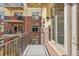 Private balcony with brick building view at 3601 Arapahoe Ave # 226, Boulder, CO 80303